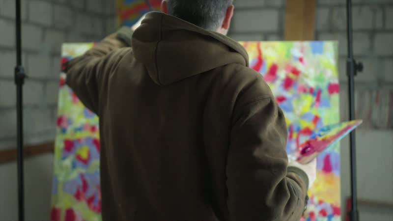 Tobias Post working on a large-format painting
